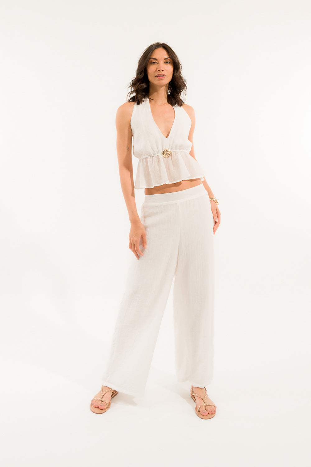 Completo top e pantalone colori azzurro e beige