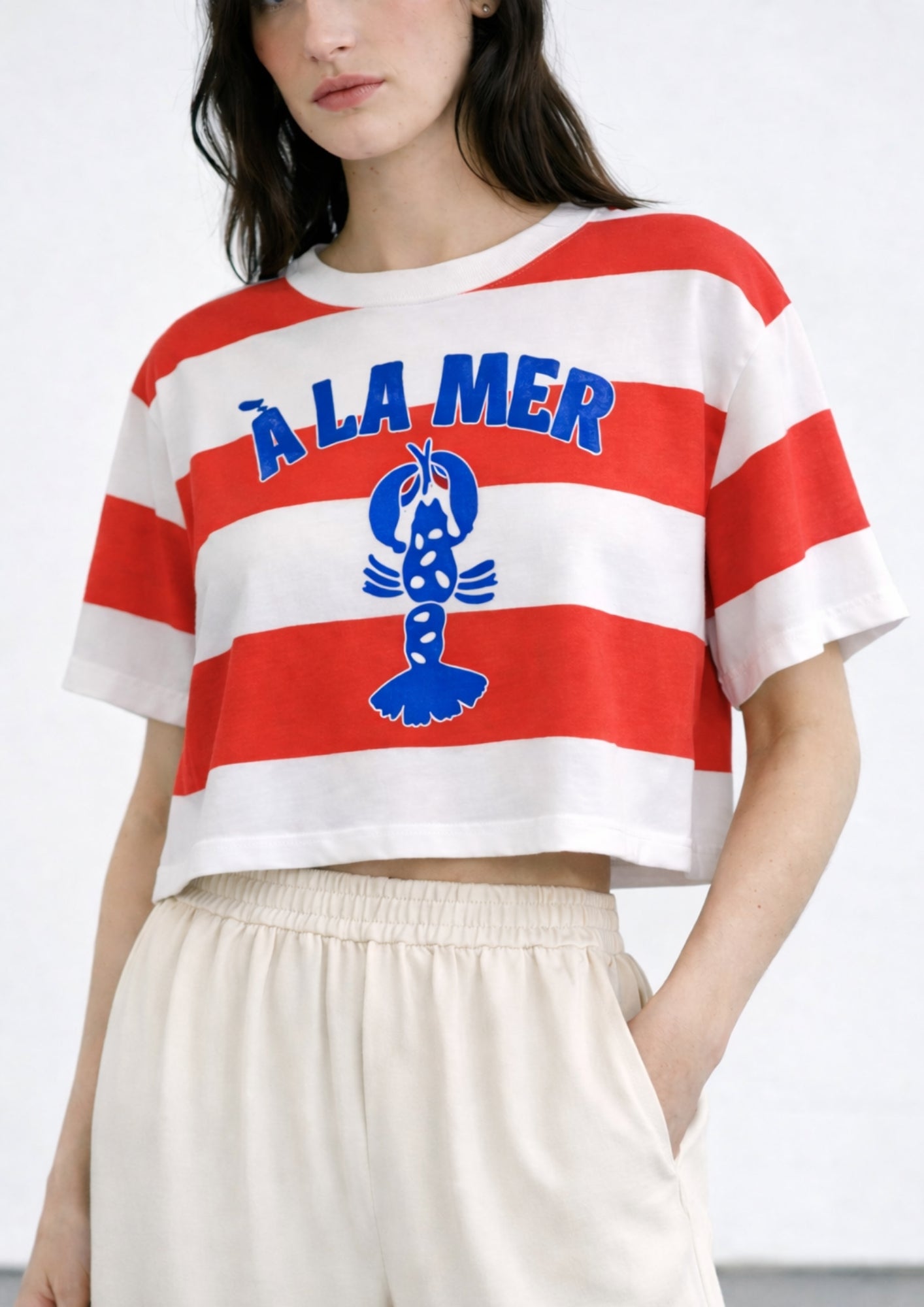 T-shirt a righe con stampa frontale